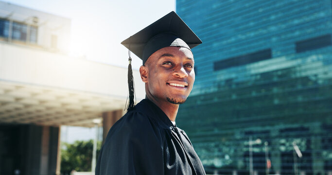 City, graduation and thinking with black man student outdoor for celebration or education event. Future, idea and scholarship with happy college or university graduate in urban town for vision