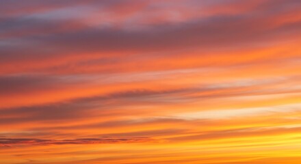 Fototapeta premium Vibrant Sunset Sky with Orange and Purple Clouds at Dusk