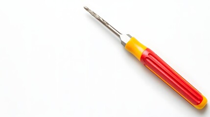Fototapeta premium A metal precision screwdriver with a red and yellow handle