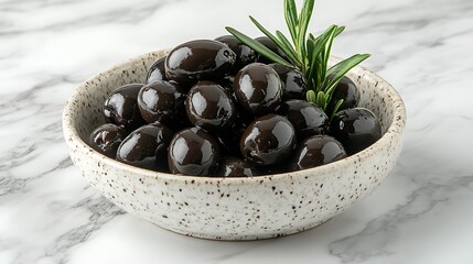 Bowl of shiny black olives garnished with rosemary.