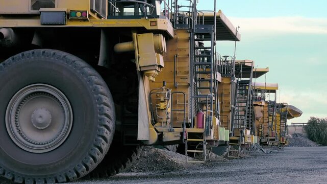 close up on the cabin mining trucks construction machinery at sunset at a diamond mine