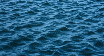 Obraz premium Serene Ocean Water Texture Deep Blue Ripples and Gentle Waves Background