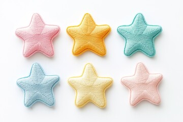 Colorful star-shaped embellishments on white background
