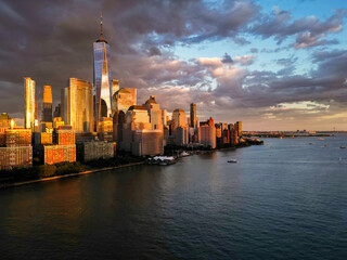 Fototapeta premium New York City an sky. NYC cityscape with skyscrapers. Aerial view of New York City skyline. Manhattan skyline. New York and Hudson River. Downtown NYC. New York skyscrapers from top.
