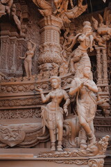 The Intricate Carvings Found on the Temple Wall Illustrate Various Divine Figures and Symbolism