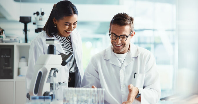 Happy, research or people in lab with results, review or medical experiment for cancer treatment. Good news, scientist or teamwork with science, test or cure sample with dna, particles or bacteria