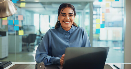Business, woman and smile with laptop in office for article proofreading, editing news publication...