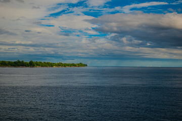 Obraz premium View of the island from the ocean on a boat during a trip in Maluku, Indonesia