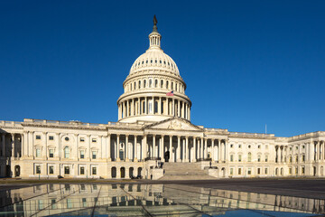 Obraz premium The Capitol symbol of USA governance. The Capitol landmark. The Capitol monument symbol of the American democratic system. The Capitol on sky background. American Capital.