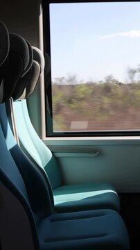 row of seats inside mayan train while moving (travel yucatan mexico) new railroad metro commuter tourist tourism travel line (maya culture) experience connection rails window riding