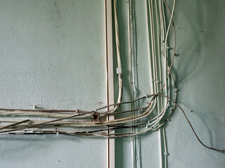 Old electrical wiring in the entrance of an apartment building.