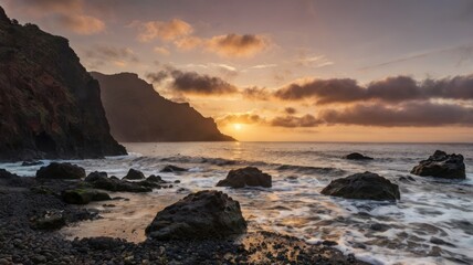 Dramatic sunset over volcanic coastline