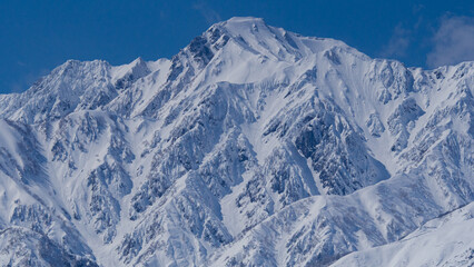 快晴の空と雪の北アルプス　長野県白馬村