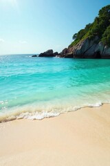 Fototapeta premium Softly glowing sand and turquoise ocean waters meet at a tranquil shoreline, beach, wave