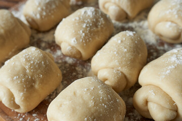 Cooking buns. Raw vanilla buns.