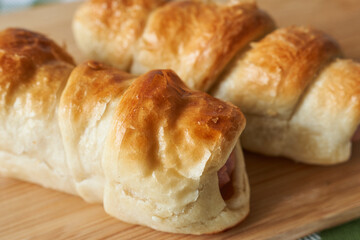 Sausages in puff pastry. Close-up.