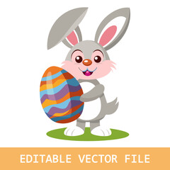 Happy easter bunny hugging decorated egg 