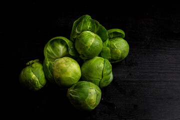 View of Brussels sprouts with black background