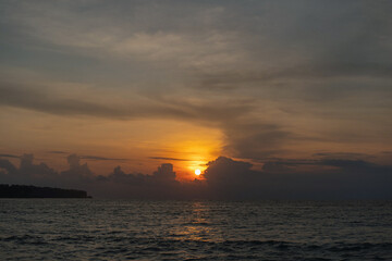 Fototapeta premium Ocean shore and beach at sunset, Bali
