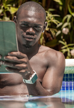 Relaxing in the Pool with a Tablet