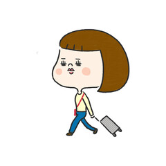 スーツケースを持って旅行に行く女性