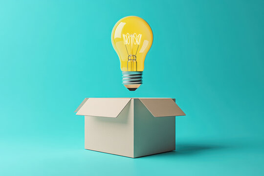 Lit light bulb hovering over an open white cardboard box on a turquoise background, representing innovative thinking and creative ideas