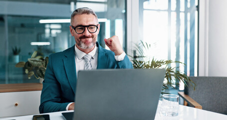Office, businessman and celebrate with fist pump for laptop, winning and settlement for corporate...