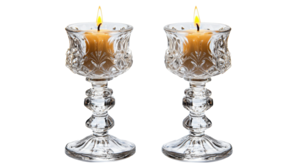 Elegantly lit candle holders casting warm glow on a cozy evening setting