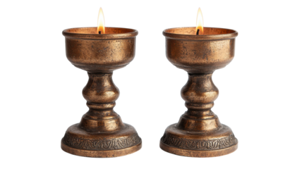Elegant bronze candle holders illuminating a cozy space with warm light during evening gatherings