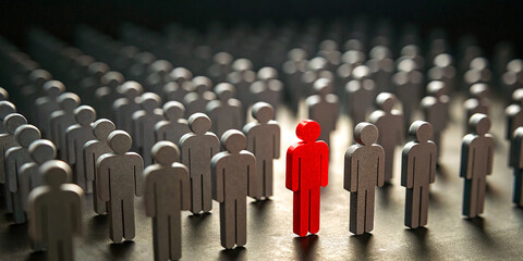 Leadership, standing out from the crowd, individuality, red figure among grey figures, contrast, uniqueness, courage, different perspective, challenging the status quo, sea of conformity, bold choice,