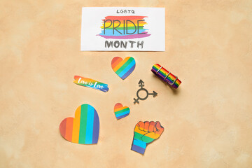 Card with text LGBTQ PRIDE MONTH and symbols on grunge background