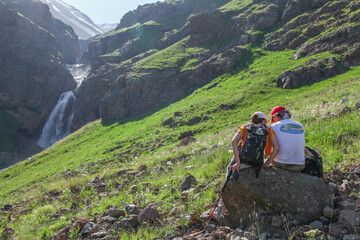 Mount Aragats, Armenia - July 16, 2013 - A senior tourist couple takes a break near Gegharot...