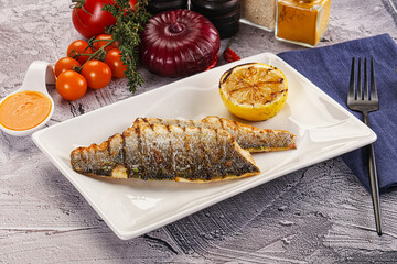 Grilled seabass fillet with lemon
