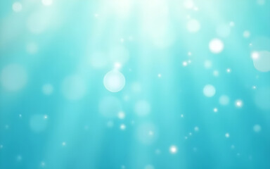 Obraz premium Light blue abstract background with glowing bokeh and particles floating