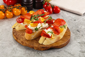 Bruschetta tapas with chorizo and tomato