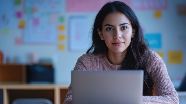 Female young hispanic university teacher, college tutor explaining math giving remote school class online lesson teaching looking at laptop in classroom by elearning webcam video conference zoom call