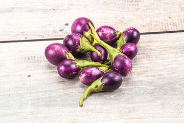 Small organic young purple round eggplant