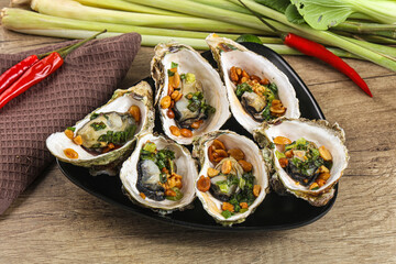 Baked oysters with green onion