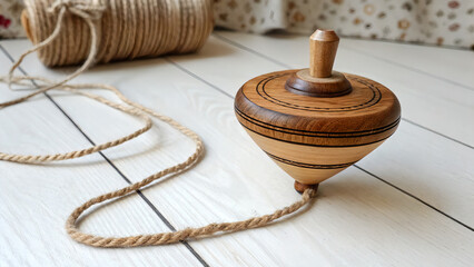 "Spin into Nostalgia: Handmade Wooden Top with String"

