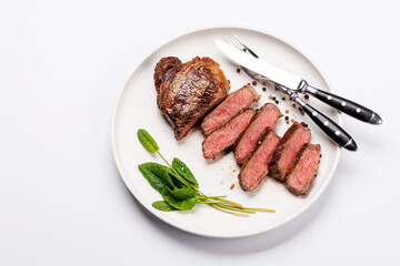 A perfectly cooked sliced striploin steak with a juicy, tender texture