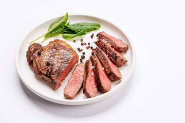 A perfectly cooked sliced striploin steak with a juicy, tender texture