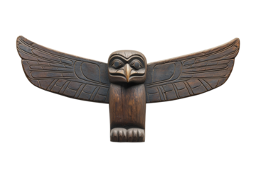 Wooden owl with its wings spread out
