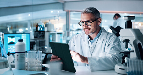 Mature man, tablet and smile at lab for medical research with DNA for human genome sequence. Person, touchscreen and clinical trial with application, results and review notes for pharmaceutical job