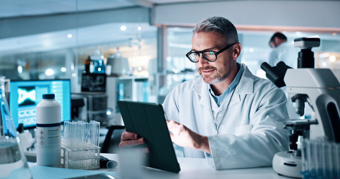 Mature man, tablet and smile at lab for medical research with DNA for human genome sequence. Person, touchscreen and clinical trial with application, results and review notes for pharmaceutical job