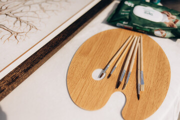 Art Supplies with Wooden Palette and Brushes for Creative Painting