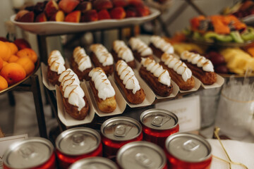 Assortment of Desserts and Beverages on a Buffet Table