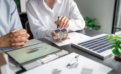 Solar panels green energy Business man working green eco friendly office business creative idea Planing Bio economy for business eco friendly professional Engineer sustainable electricity.