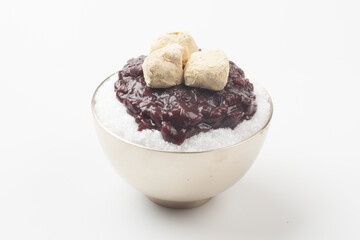  Patbingsu is a food made by crushing ice into small pieces and adding boiled red beans or sugar.