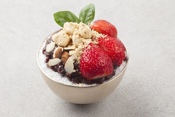  Patbingsu is a food made by crushing ice into small pieces and adding boiled red beans or sugar.