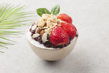  Patbingsu is a food made by crushing ice into small pieces and adding boiled red beans or sugar.